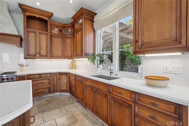6337 Via Colinita, Rancho Palos Verdes, CA 90275 - kitchen featuring premium range hood, stone tile flooring, light countertops, brown cabinets, and recessed lighting
