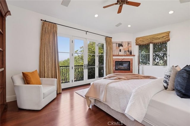 6337 Via Colinita, Rancho Palos Verdes, CA 90275 - bedroom with access to outside, wood finished floors, recessed lighting, ceiling fan, and a glass covered fireplace