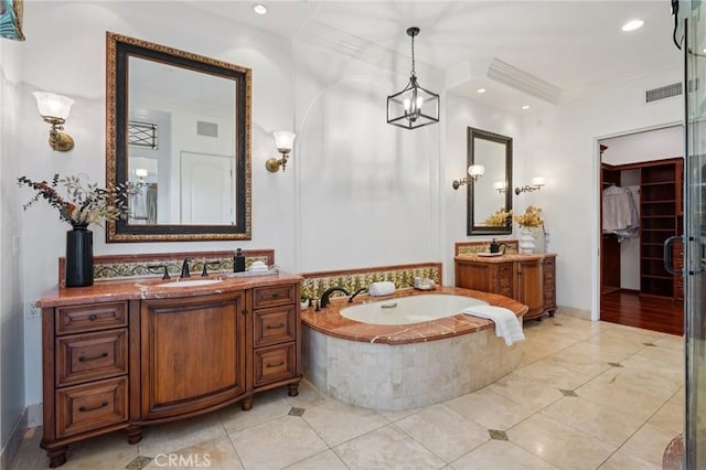 6337 Via Colinita, Rancho Palos Verdes, CA 90275 - full bathroom with two vanities, a bath, ornamental molding, tile patterned floors, and recessed lighting