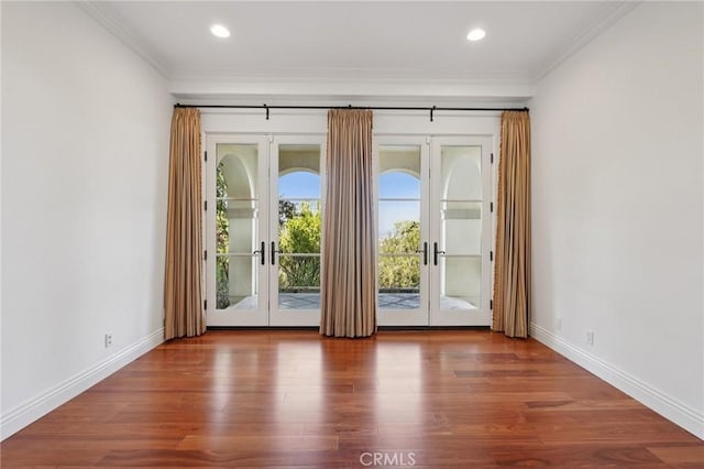 6337 Via Colinita, Rancho Palos Verdes, CA 90275 - spare room with french doors, ornamental molding, wood finished floors, and recessed lighting