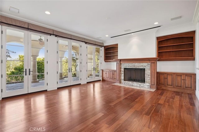 6337 Via Colinita, Rancho Palos Verdes, CA 90275 - unfurnished living room with french doors, crown molding, wood finished floors, a fireplace, and recessed lighting