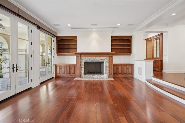 6337 Via Colinita, Rancho Palos Verdes, CA 90275 - unfurnished living room with dark wood-style flooring, french doors, ornamental molding, a fireplace with flush hearth, and recessed lighting