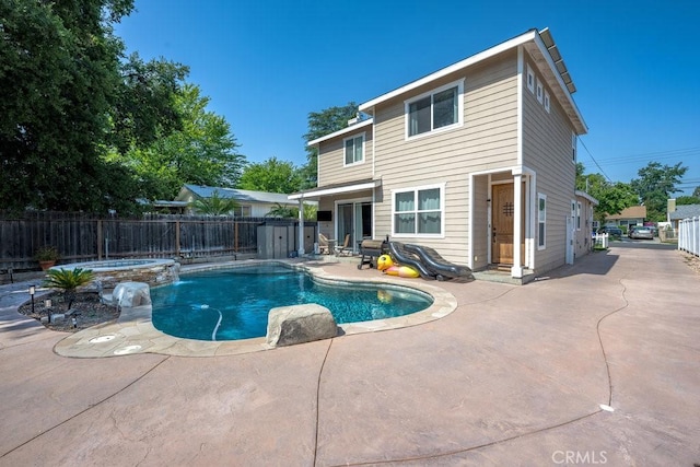 25252 Atwood Blvd, Newhall, CA 91321 - view of swimming pool featuring a patio, a fenced backyard, and a pool with connected hot tub