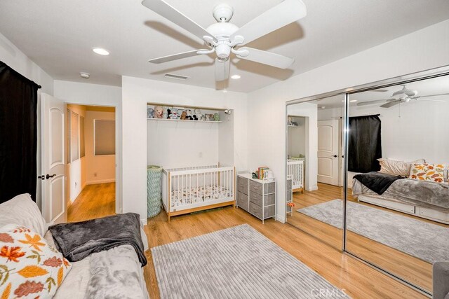 25252 Atwood Blvd, Newhall, CA 91321 - bedroom with wood finished floors, recessed lighting, a closet, and a ceiling fan