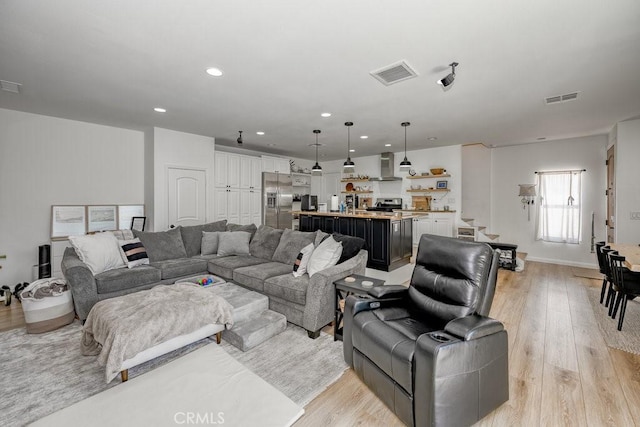 25252 Atwood Blvd, Newhall, CA 91321 - living area with light wood-type flooring and recessed lighting