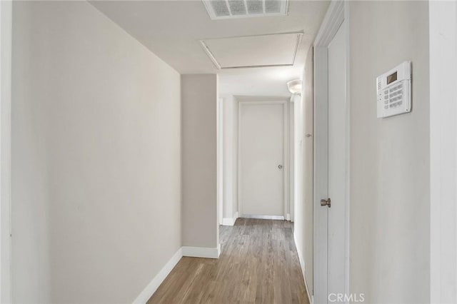 10632 Larry Dr, Anaheim, CA 92804 - hallway featuring light wood-type flooring and baseboards