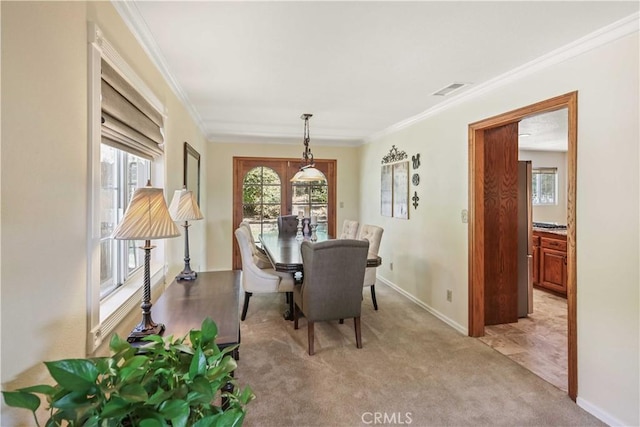 18836 Cedar Valley Way, Newhall, CA 91321 - dining area with crown molding and light carpet