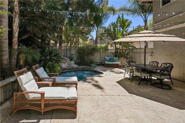 18836 Cedar Valley Way, Newhall, CA 91321 - fenced backyard featuring a patio area and outdoor dining space