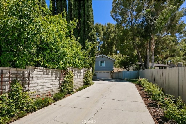 18836 Cedar Valley Way, Newhall, CA 91321 - view of concrete driveway
