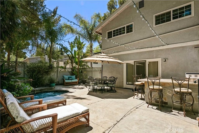 18836 Cedar Valley Way, Newhall, CA 91321 - fenced backyard with a patio area and an outdoor hangout area
