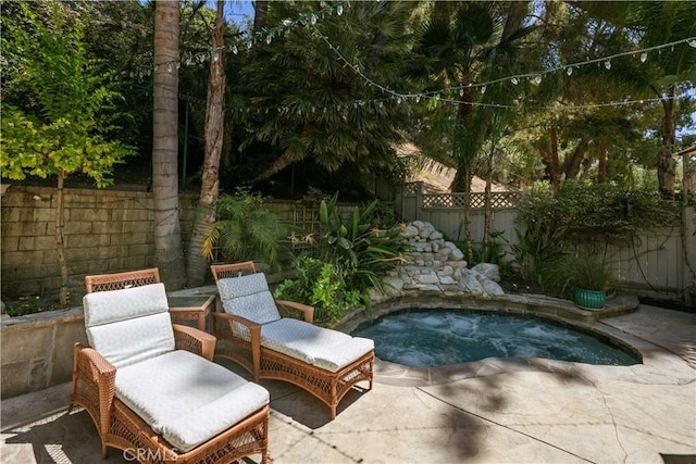 18836 Cedar Valley Way, Newhall, CA 91321 - view of swimming pool with an in-ground hot tub, a fenced backyard, and a patio
