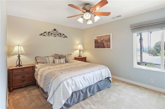 18836 Cedar Valley Way, Newhall, CA 91321 - bedroom with light carpet and a ceiling fan