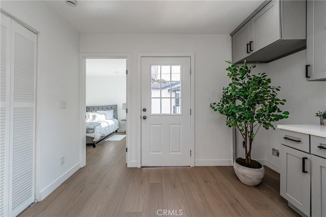 3818 Crawford St, Los Angeles, CA 90011 - entryway featuring light wood-style flooring and baseboards