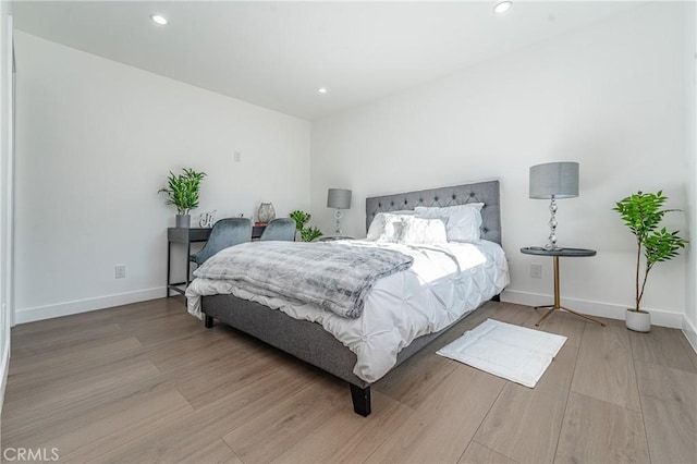 3818 Crawford St, Los Angeles, CA 90011 - bedroom with wood finished floors and recessed lighting