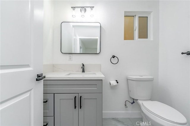 3818 Crawford St, Los Angeles, CA 90011 - half bath with vanity and marble look tile flooring