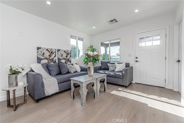 3818 Crawford St, Los Angeles, CA 90011 - living area featuring light wood-style flooring and recessed lighting