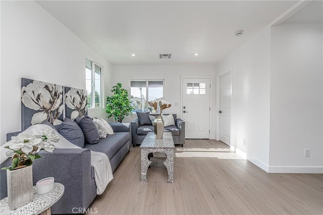 3818 Crawford St, Los Angeles, CA 90011 - living room featuring light wood finished floors and recessed lighting