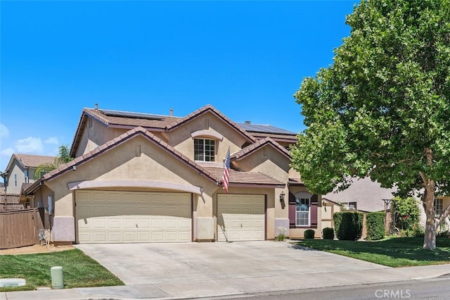 23050 Catt Rd, Wildomar, CA 92595 - view of front of property with driveway, solar panels, stucco siding, a garage, and a tile roof