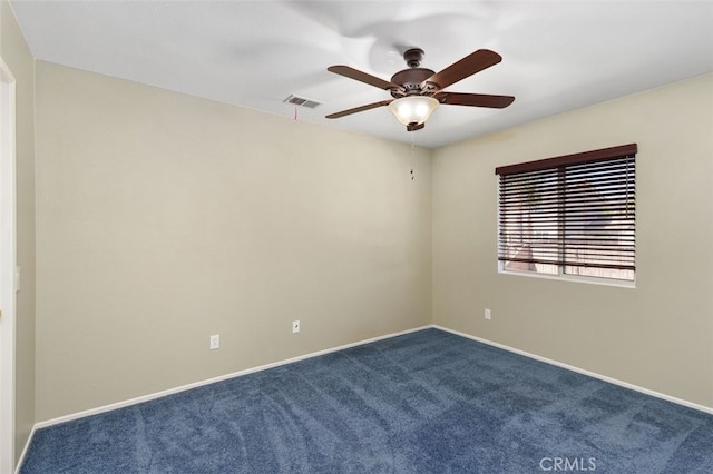 23050 Catt Rd, Wildomar, CA 92595 - unfurnished room with dark colored carpet and a ceiling fan