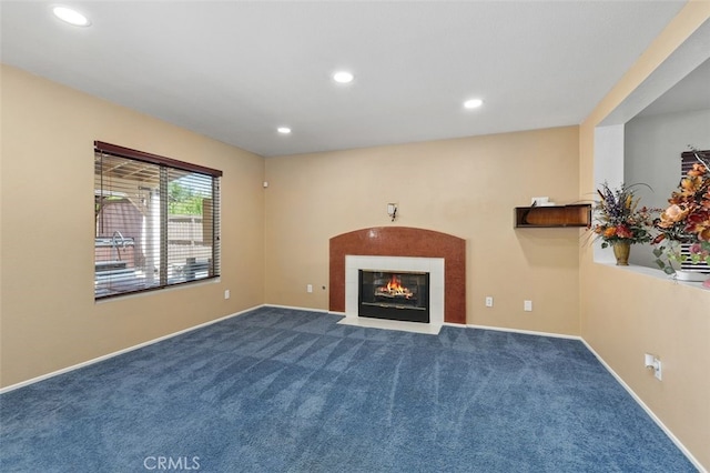 23050 Catt Rd, Wildomar, CA 92595 - unfurnished living room featuring carpet flooring, recessed lighting, and a tile fireplace