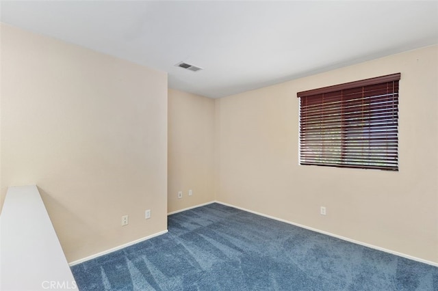23050 Catt Rd, Wildomar, CA 92595 - spare room with dark colored carpet and baseboards