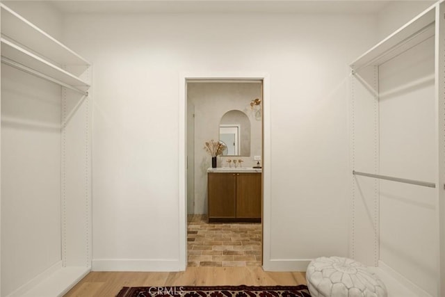 2334 Glover Pl, Los Angeles, CA 90031 - walk in closet with light wood-type flooring