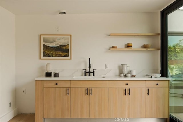 2334 Glover Pl, Los Angeles, CA 90031 - bar featuring a sink and light wood finished floors