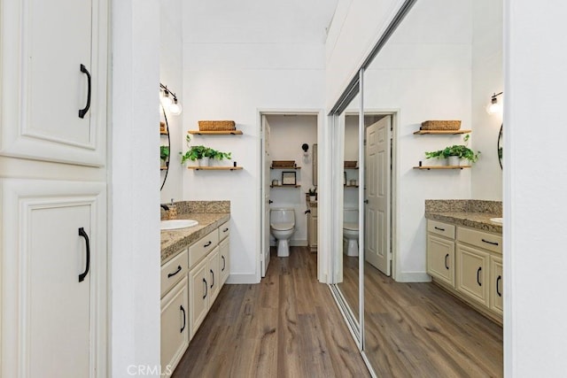20371 Bluffside Cir Unit B401, Huntington Beach, CA 92646 - full bath with two vanities and wood finished floors