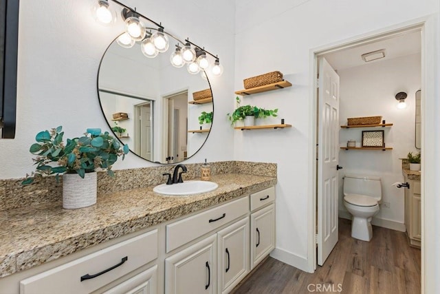 20371 Bluffside Cir Unit B401, Huntington Beach, CA 92646 - bathroom featuring vanity and wood finished floors