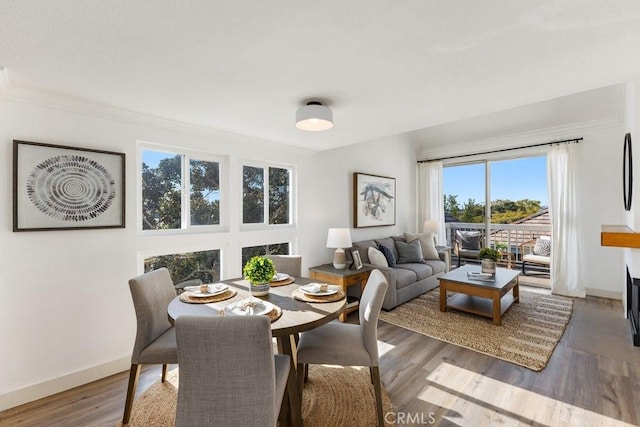 20371 Bluffside Cir Unit B401, Huntington Beach, CA 92646 - dining area with crown molding and wood finished floors