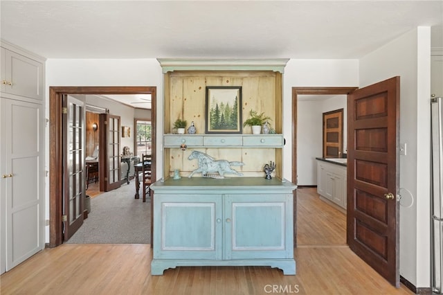 10821 Los Jordans Rd, Agua Dulce, CA 91390 - hall featuring light wood-style floors and french doors