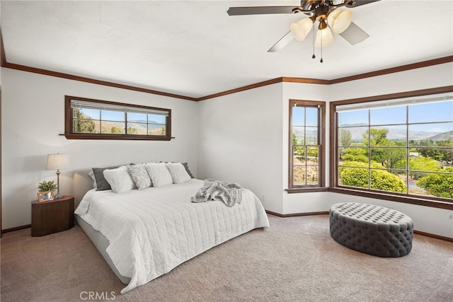 10821 Los Jordans Rd, Agua Dulce, CA 91390 - carpeted bedroom with multiple windows, a ceiling fan, and crown molding