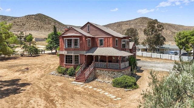 10821 Los Jordans Rd, Agua Dulce, CA 91390 - chalet / cabin with covered porch, stairway, a mountain view, and roof with shingles