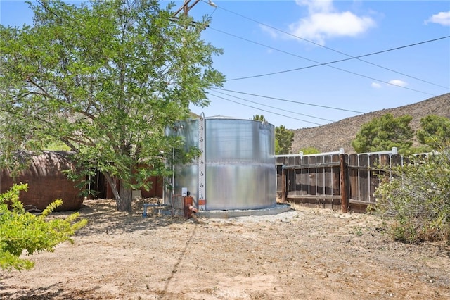 10821 Los Jordans Rd, Agua Dulce, CA 91390 - view of yard featuring an exterior structure, an outdoor structure, and a mountain view