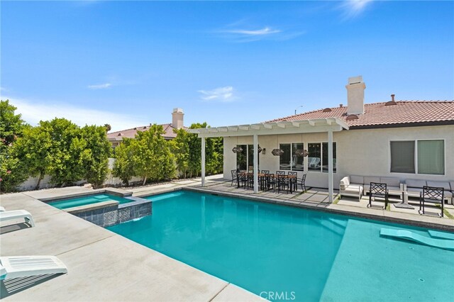 80848 Sunspring Ct, Indio, CA 92201 - view of pool with a patio, an outdoor hangout area, and a pool with connected hot tub