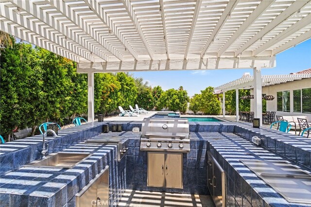 80848 Sunspring Ct, Indio, CA 92201 - view of patio featuring an outdoor pool, a pergola, and area for grilling