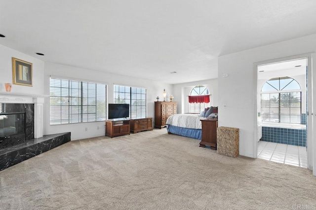 5855 Kappa St, La Mesa, CA 91942 - carpeted bedroom with a premium fireplace and connected bathroom