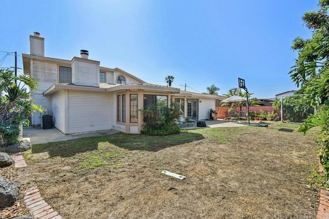 5855 Kappa St, La Mesa, CA 91942 - back of house featuring a patio and a chimney