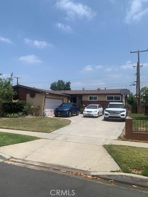 9647 Dicky St, Pico Rivera, CA 90660 - view of front of home with concrete driveway