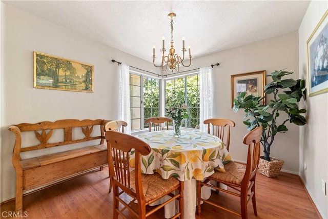 762 Twin Peaks Ave, Simi Valley, CA 93065 - dining room with a chandelier and light wood finished floors