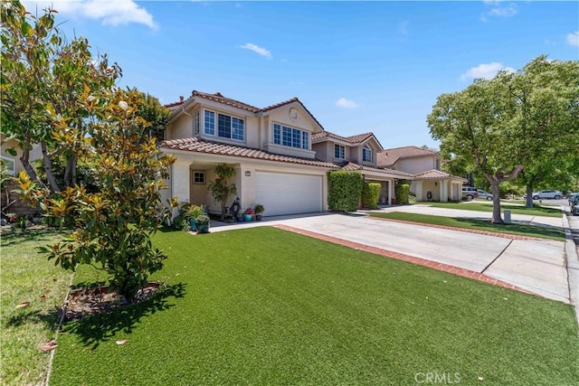 762 Twin Peaks Ave, Simi Valley, CA 93065 - mediterranean / spanish-style house featuring driveway, stucco siding, a tiled roof, a front lawn, and an attached garage