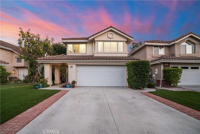 762 Twin Peaks Ave, Simi Valley, CA 93065 - traditional-style house with driveway, an attached garage, stucco siding, a yard, and a tiled roof