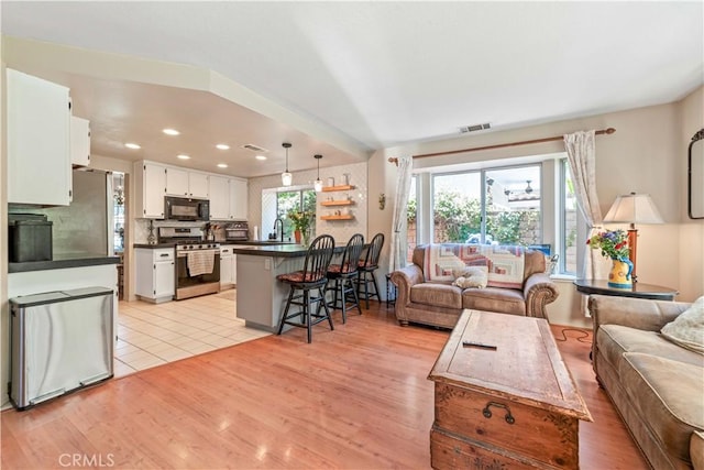 762 Twin Peaks Ave, Simi Valley, CA 93065 - living room featuring light wood-style floors and recessed lighting