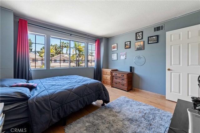 762 Twin Peaks Ave, Simi Valley, CA 93065 - bedroom with wood finished floors and a textured ceiling
