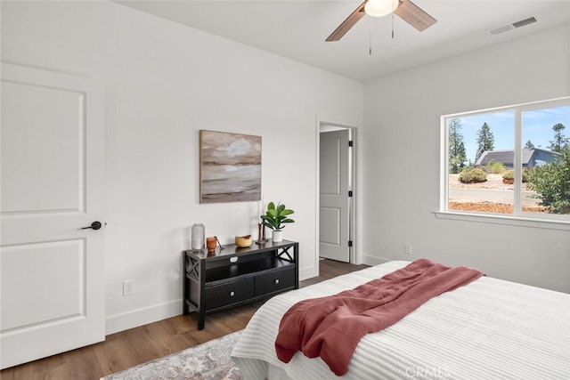 6105 Maxwood Dr, Paradise, CA 95969 - bedroom with wood finished floors and a ceiling fan