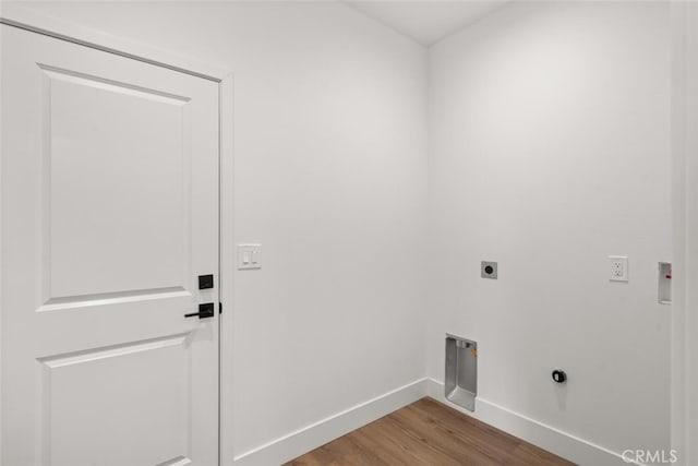6105 Maxwood Dr, Paradise, CA 95969 - washroom featuring electric dryer hookup, wood finished floors, and hookup for a washing machine