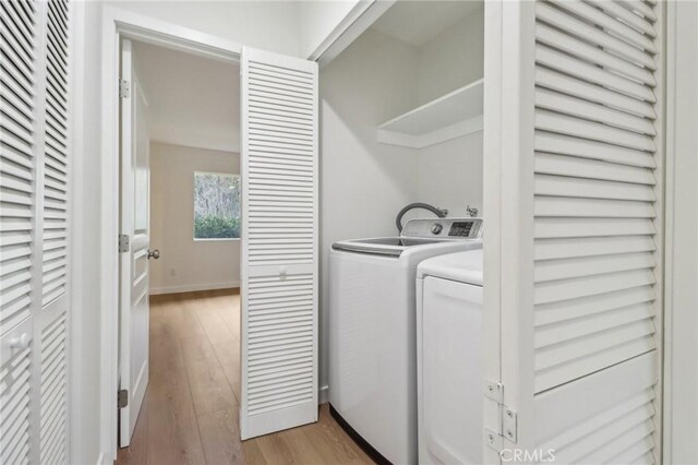 28512 Conejo View Dr, Agoura Hills, CA 91301 - laundry area featuring light wood-type flooring and independent washer and dryer