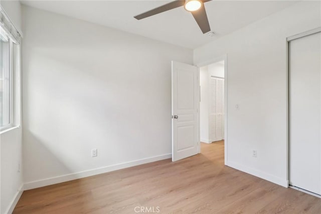 28512 Conejo View Dr, Agoura Hills, CA 91301 - unfurnished bedroom with light wood-style flooring, a closet, and a ceiling fan