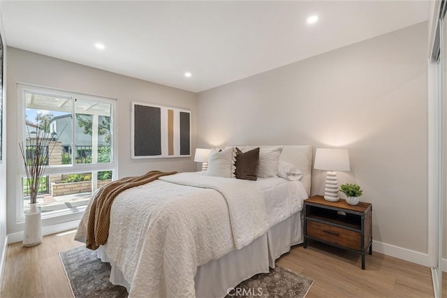14 Willow Tree Ln, Irvine, CA 92612 - bedroom featuring light wood-style flooring and recessed lighting