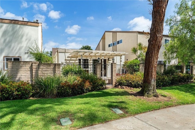 14 Willow Tree Ln, Irvine, CA 92612 - view of front of home featuring stucco siding and a pergola